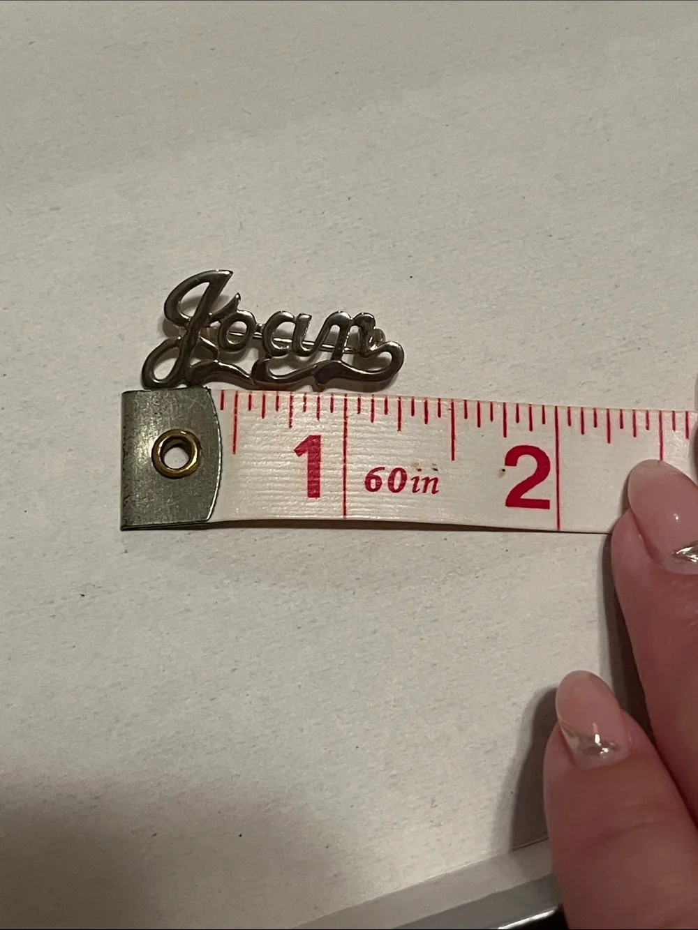 Silver tone ‘Joan’ pin